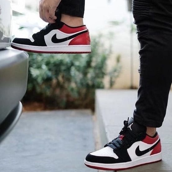 AJ1 Low Black Toe StepIn Trends